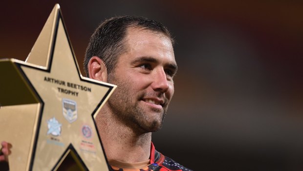 BRISBANE, AUSTRALIA - FEBRUARY 13:  Cameron Smith of the World All Stars holds the Arthur Beetson trophy after the NRL match between the Indigenous All-Stars and the World All-Stars at Suncorp Stadium on February 13, 2016 in Brisbane, Australia.  (Photo by Matt Roberts/Getty Images)