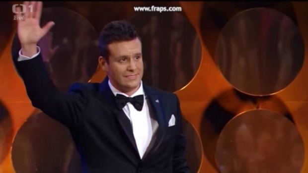 Hari Zinhasovic, a Jim Carrey impersonator, appears on stage at Czech film awards. 