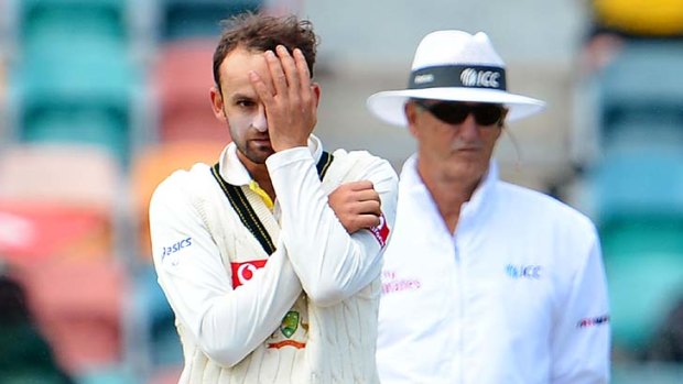 Hard day at the office ... Nathan Lyon in Hobart on Tuesday.