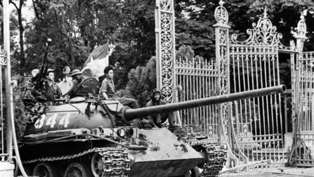 A North Vietnamese tank rolls through the gates of the Presidential Palace in Saigon on April 30, 1975.
