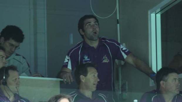 Watchful eye ... Melbourne's Cameron Smith rests up.
