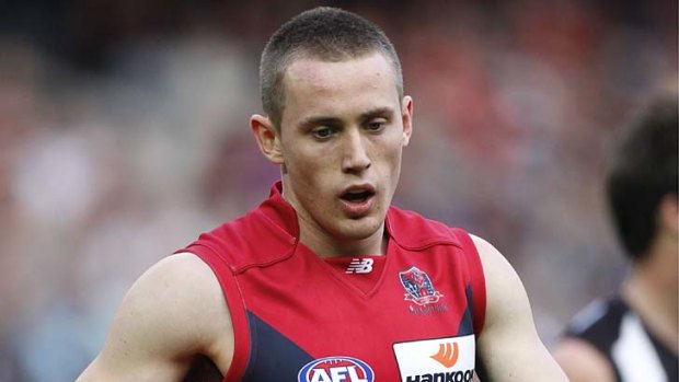 Demons midfielder Tom Scully out of action.