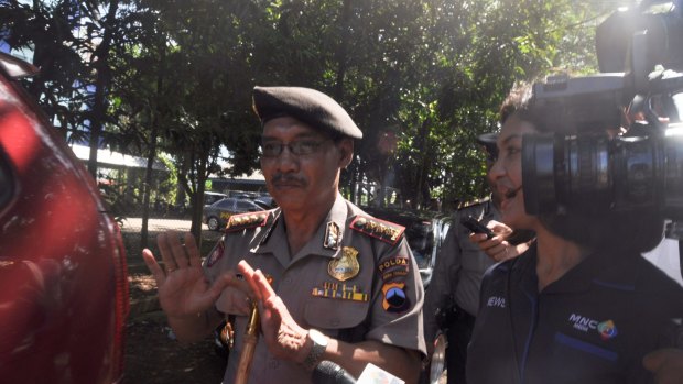 Police oversee preparations for the executions in Cilacap, the closest town to Nusakambangan where the prisoners will be shot.

