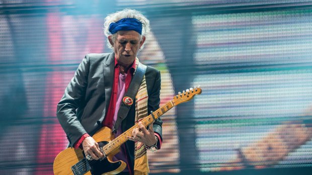 Keith Richards of The Rolling Stones perform at the 2013 Glastonbury Festival.