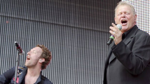 Inspired ... John Farnham on stage with Chris Martin in Sydney, March 2009.