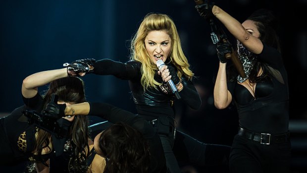 Madonna performs in London as part of her MDNA tour.