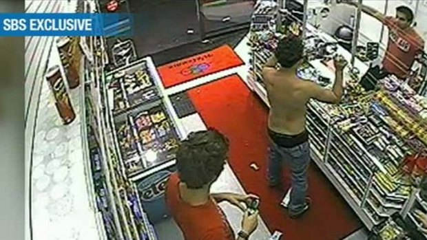 In the frame &#8230; these stills, taken from CCTV inside a convenience store, show Roberto Laudisio Curti at the shop counter ...