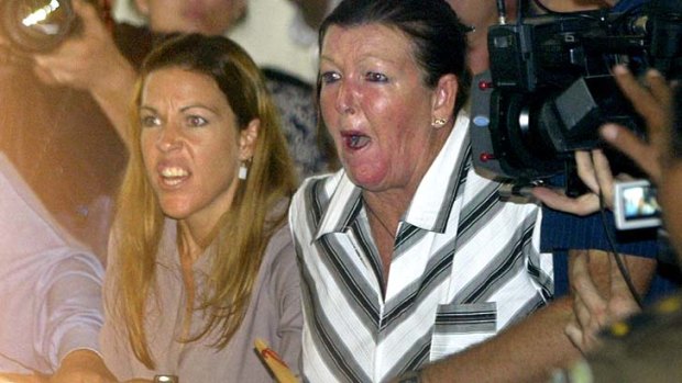 May 2005: Schapelle Corby's mother Rosleigh Rose, right, and sister Mercedes, left, reacts to judges' verdict during her trial.