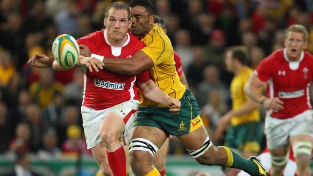 Dividends to come &#8230; Gethin Jenkins runs into Wycliff Palu. Pho