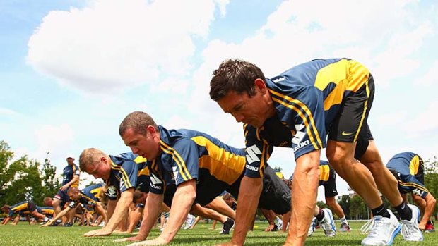 Robbie McEwen (right) participates in a skills session with the Melbourne Storm at Gosch's Paddock last week.