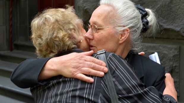 Emotional ... Christina Halvagis, the mother of Mersina Halvagis, is consoled outside the Court of Appeal.