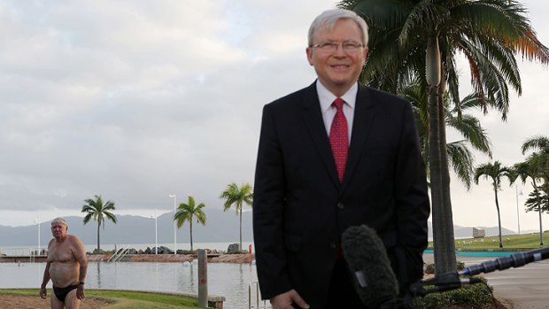 Prime Minister Kevin Rudd conducts TV interviews on the Strand in Townsville on Monday.