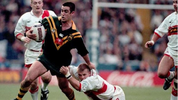 Australia's Andrew Johns is tackled by the England defence during their 1995 Rugby League World Cup Final at Wembley.  Australia won 16-8.