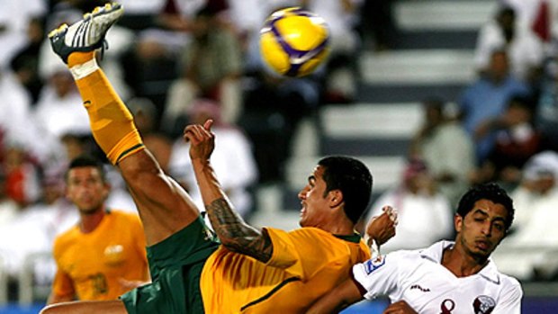 On their way...Australia play Qatar to a draw - and make the World Cup finals.