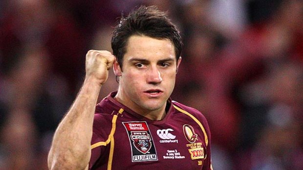 Cooper Cronk celebrates after kicking the winning field goal during game three of the 2012 State of Origin series.