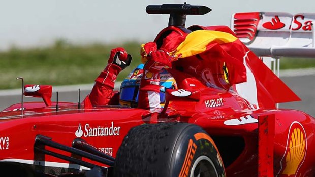 Dominant: Ferrari and Spain's Fernando Alonso.