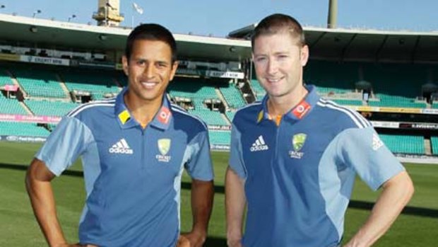 Usman Khawaja and Michael Clarke pose after the announcement of the squad for the fifth and final Test at the SCG.
