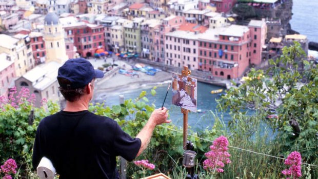 An artist at Cinque Terre, Italy.