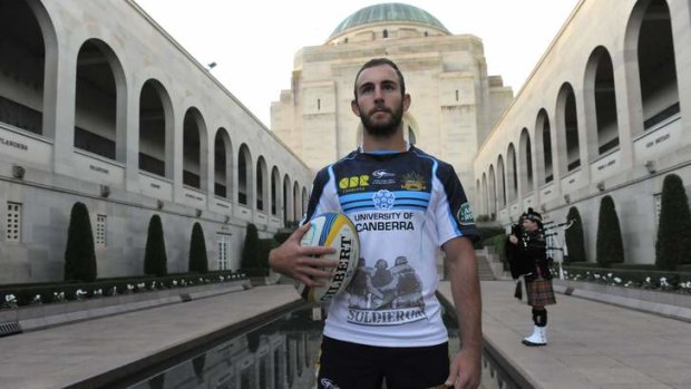 Brumbies player Nic White was one of four players involved in a wreath laying ceremony ahead of their Anzac Day match.