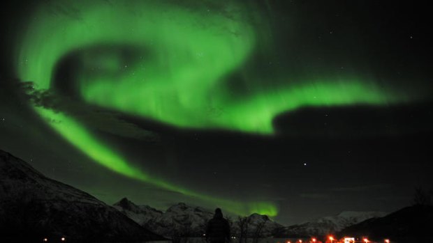 Potentially disruptive ... scientists said aurora borealis such as this one, near the city of Tromsoe, northern Norway on Tuesday, may signal a new solar cycle of geomagnetic storms that could disrupt satellite technology.