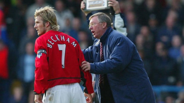 Alex Ferguson gives instructions to David Beckham during in 2002.