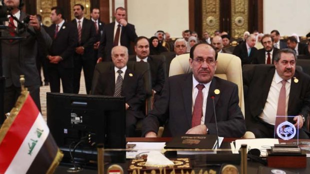 "Iraq is afraid of the attempts to militarise the Arab uprisings" ...  Iraqi Prime Minister Nouri al-Maliki attends the Arab League summit in Baghdad.