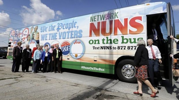 Vice-President Joe Biden steps off the Nuns on the Bus tour bus during a stop in Des Moines, Iowa. 