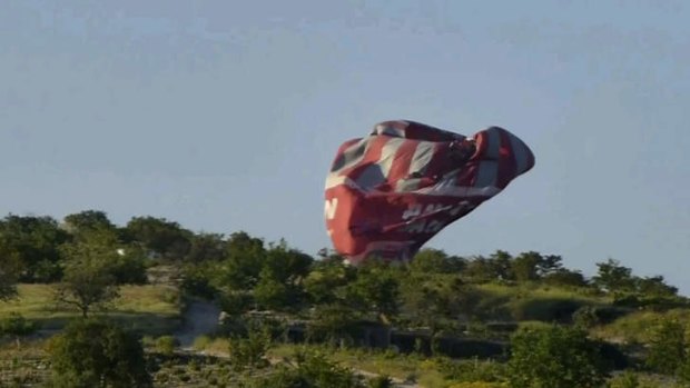Tourist tragedy: The balloon was filmed crashing to the ground.