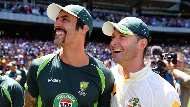 All smiles: Australia's Mitchell Johnson (left) and Michael Clarke.