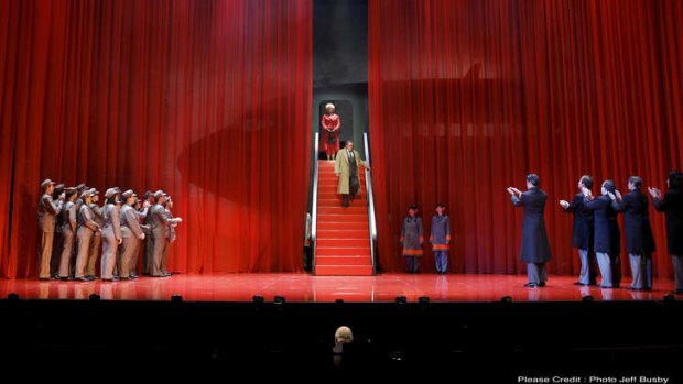 Barry Ryan descends the stairs as Richard Nixon in Victorian Opera's Nixon In China.