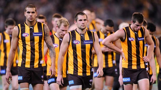 Luke Hodge leads his team off the ground after last year's preliminary final disappointment.