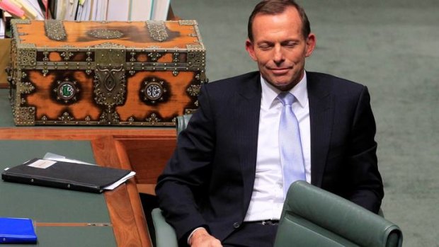 Opposition Leader Tony Abbott listens to Independent MP tony Windsor.