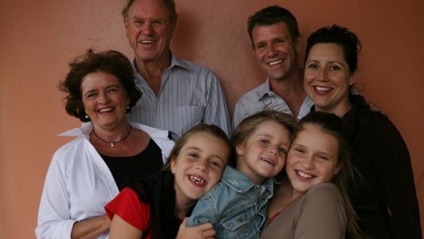 Mike Baird in 2007 with his parents Bruce and Judy (far left), his wife Kerryn (right) and children Cate, Luke and Laura.