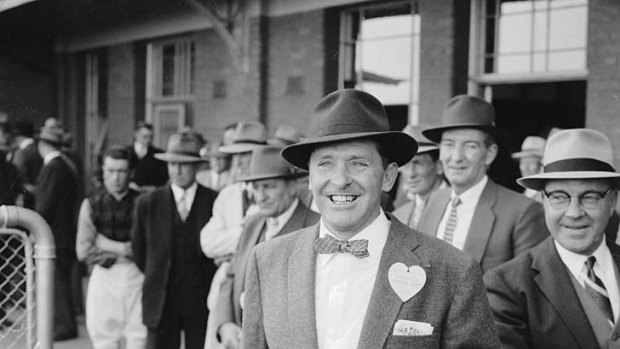 Happy trainer: Tommy Smith after Tulloch's cup win in 1957.