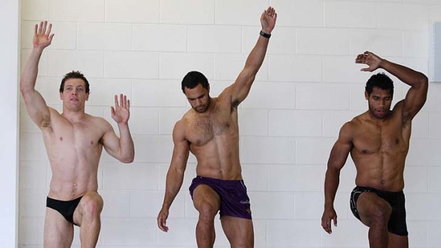Step to it: Storm players Rory Kostjasyn, Dane Nielsen and Sisa Waqa exercise yesterday.