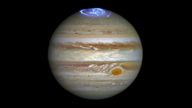 This composite image provided by NASA illustrates auroras on the planet Jupiter produced using a photograph made by the Hubble Space Telescope.

