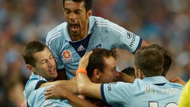 What a feeling: Sydney FC let off some steam in a morale-boosting win.
