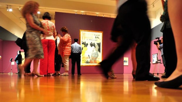 Patrons get their first glance at the exhibition, which opens to the public tomorrow.