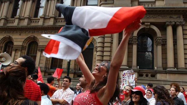 Joy ... Australian Egytian Perihan Salam celebrates Hosni Mubarak's departure at Town Hall.