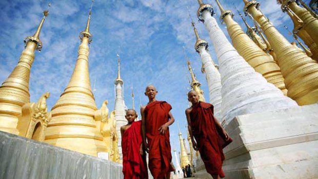 Praying, not polling: Buddhist monks walk through the Shwe Indein Pagoda near Inle Lake in Rangoon.