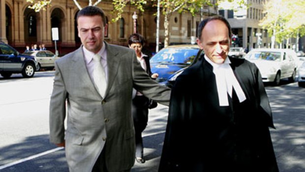 Harry Kakavas (left) leaves the Melbourne Supreme Court on May 19.