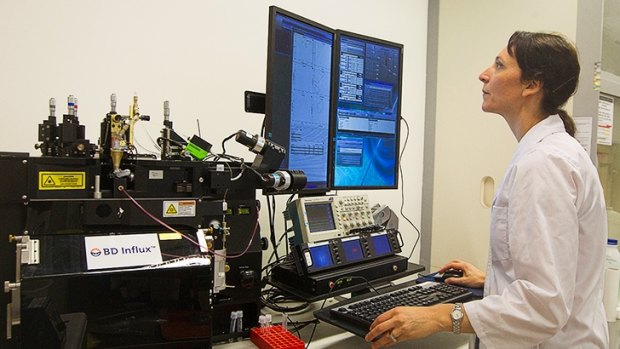 Dr Martina Doblin at work in her UTS lab with equipment she will take to sea.