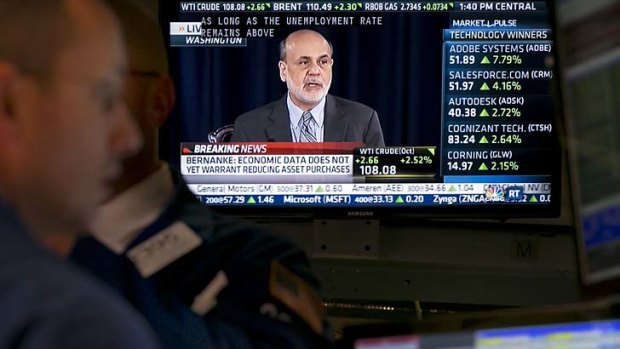 Where to now?:Traders at the NYSE watcxh the Ben Bernanke press conference.