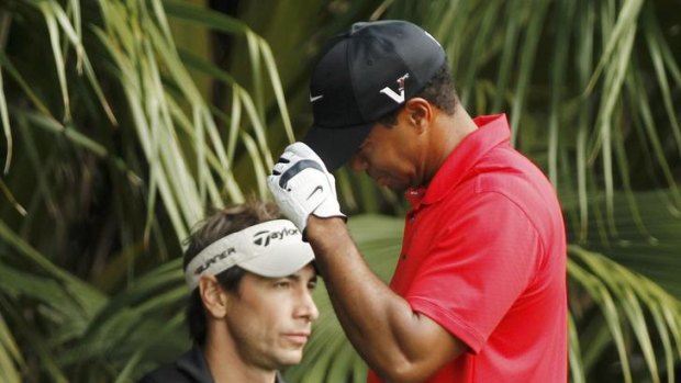 In pain ... Tiger Woods.