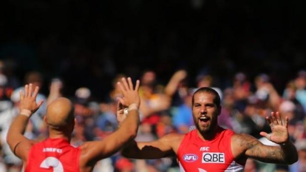 Jarrad McVeigh and Lance Franklin celebrate a goal during the Swans' victory