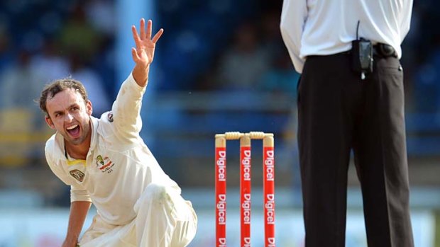 Nathan Lyon precipitated a late innings collapse.