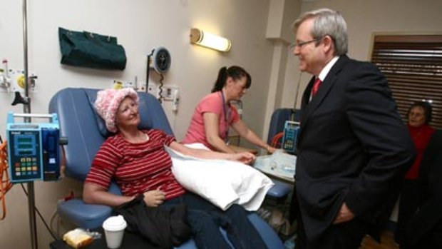 New focus...the Prime Minister, Kevin Rudd, takes a break from the ETS stoush and visits Diane Lowerson in the oncology ward at the Northern Hospital in Melbourne.