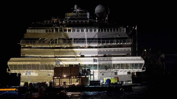 The Costa Concordia rests upright on the Tuscan Island of Giglio, Italy.
