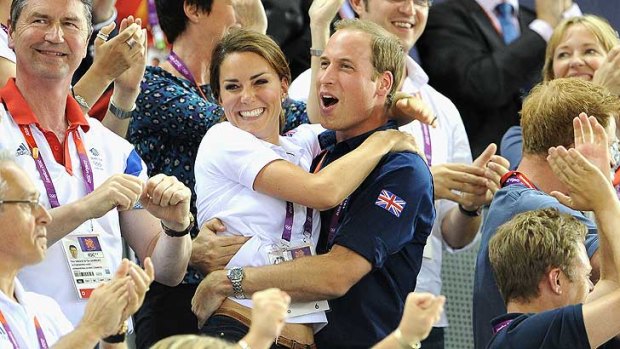 Royals celebrate ... Catherine, Duchess of Cambridge,  and Prince William embrace after Philip Hindes, Jason Kenny and Sir Chris Hoy win the gold in the Men's Team Sprint.