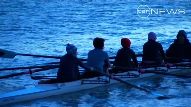 Another group of teens row on the Brisbane River near the scene of this morning's accident.